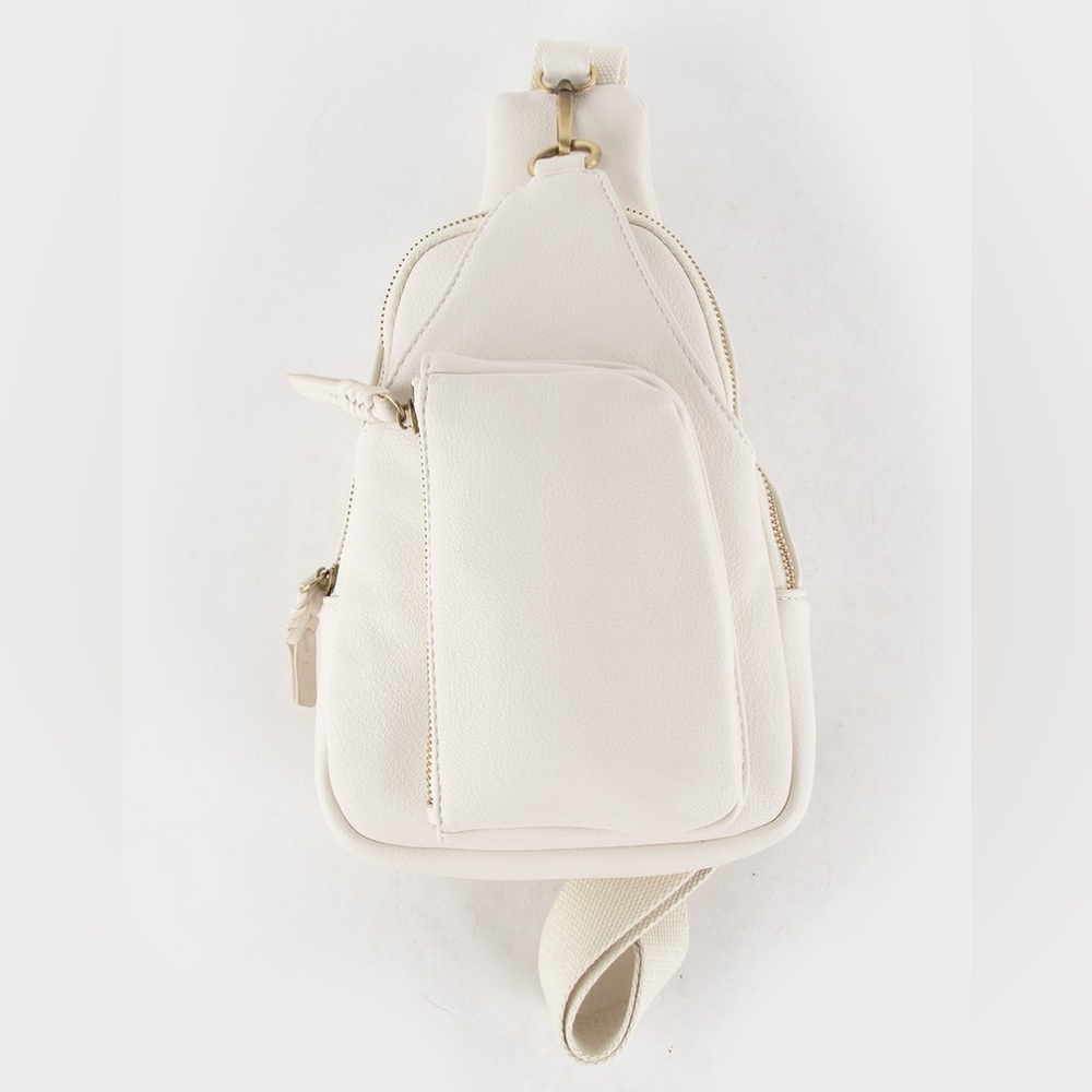 NEW WITH TAG Tilly’s Sling pouch backpack in Ivory